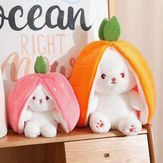 stufsi berry plush next to the stufsi carrot plush